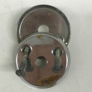 WC-oven vääntimen peitekilpi