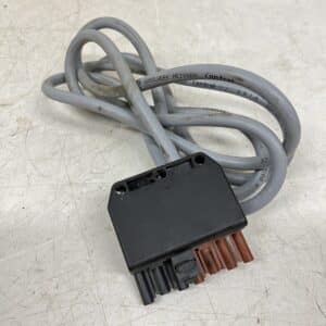 Öljypolttimen Oilon Junior syöttöliitin urospuoli johdolla